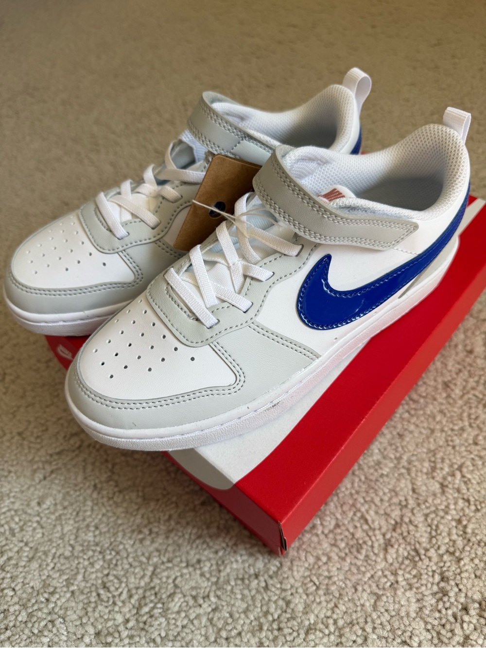Nike Kids' Court Borough Low Retreat Recraft White Sneakers with Blue Swoosh
